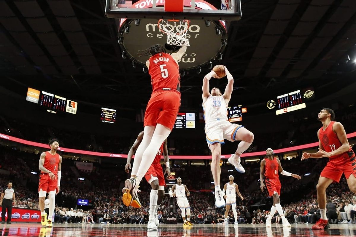 Mar 6, 2024; Portland, Oregon, USA; Oklahoma City Thunder small forward Gordon Hayward (33) shoots the ball over Portland Trail Blazers guard Dalano Barton (5) during the second half at Moda Center.