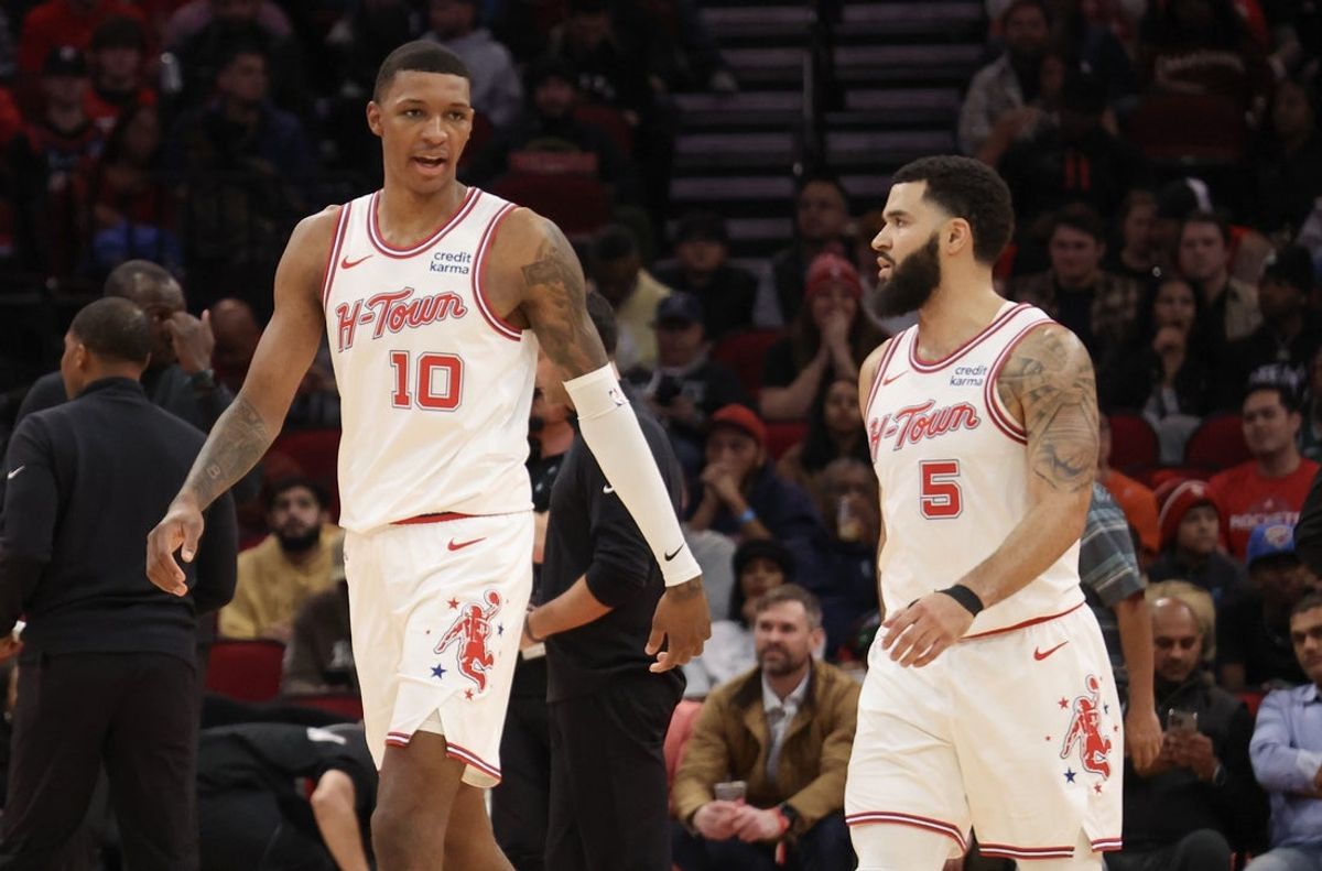 Dec 6, 2023; Houston, Texas, USA; Houston Rockets forward Jabari Smith Jr. (10) talks to guard Fred VanVleet (5) during a Oklahoma City Thunder timeout  in the second quarter at Toyota Center. Mandatory Credit: Thomas Shea-Imagn Images