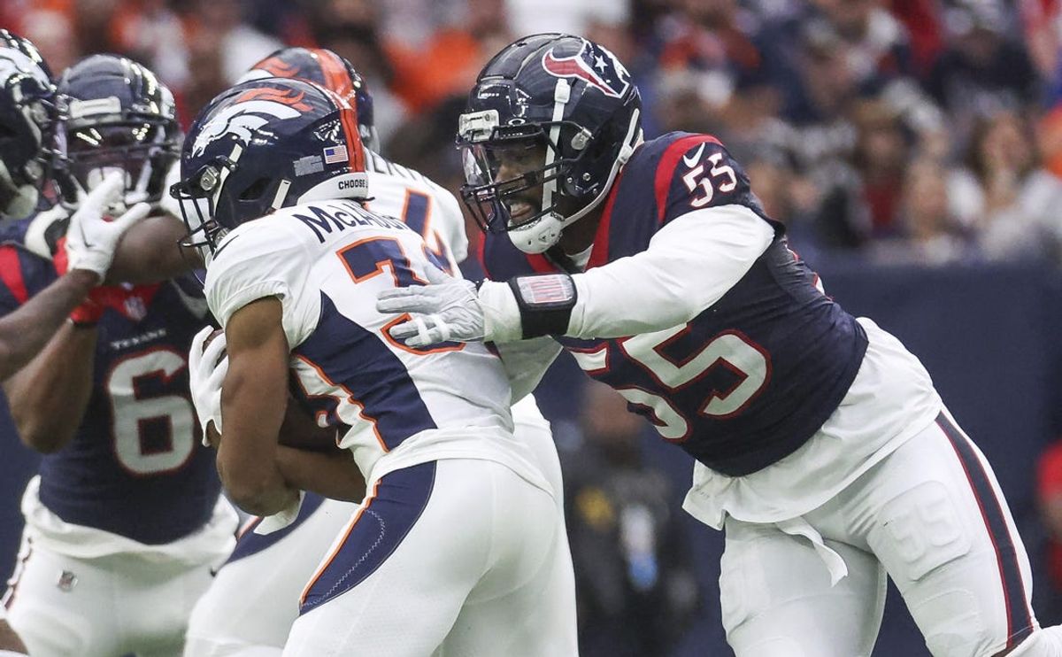 Dec 3, 2023; Houston, Texas, USA; Houston Texans defensive end Jerry Hughes (55) attempts to tackle Denver Broncos running back Jaleel McLaughlin (38) during the game at NRG Stadium. Mandatory Credit: Troy Taormina-USA TODAY Sports