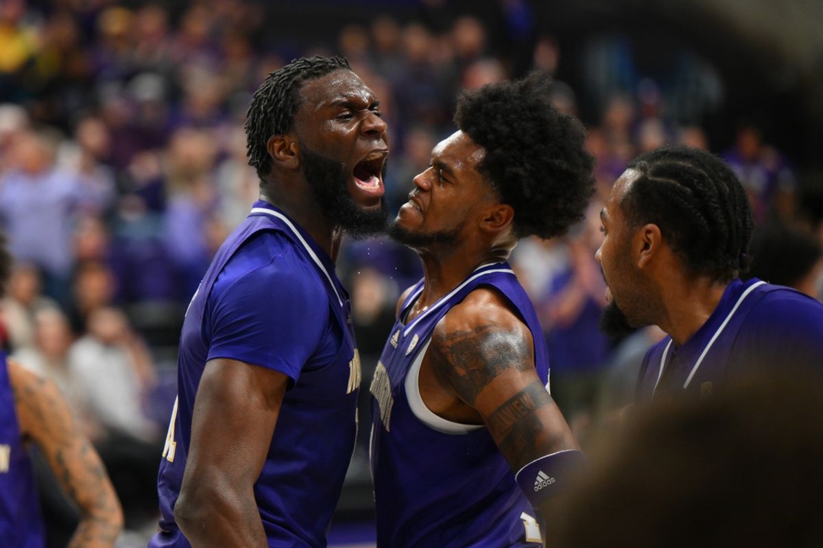 Dec 9, 2023; Seattle, Washington, USA; Washington Huskies center Franck Kepnang (11) and forward Keion Brooks Jr. (1) celebrate during the first half against the Gonzaga Bulldogs at Alaska Airlines Arena at Hec Edmundson Pavilion. Mandatory Credit: Steven Bisig-Imagn Images