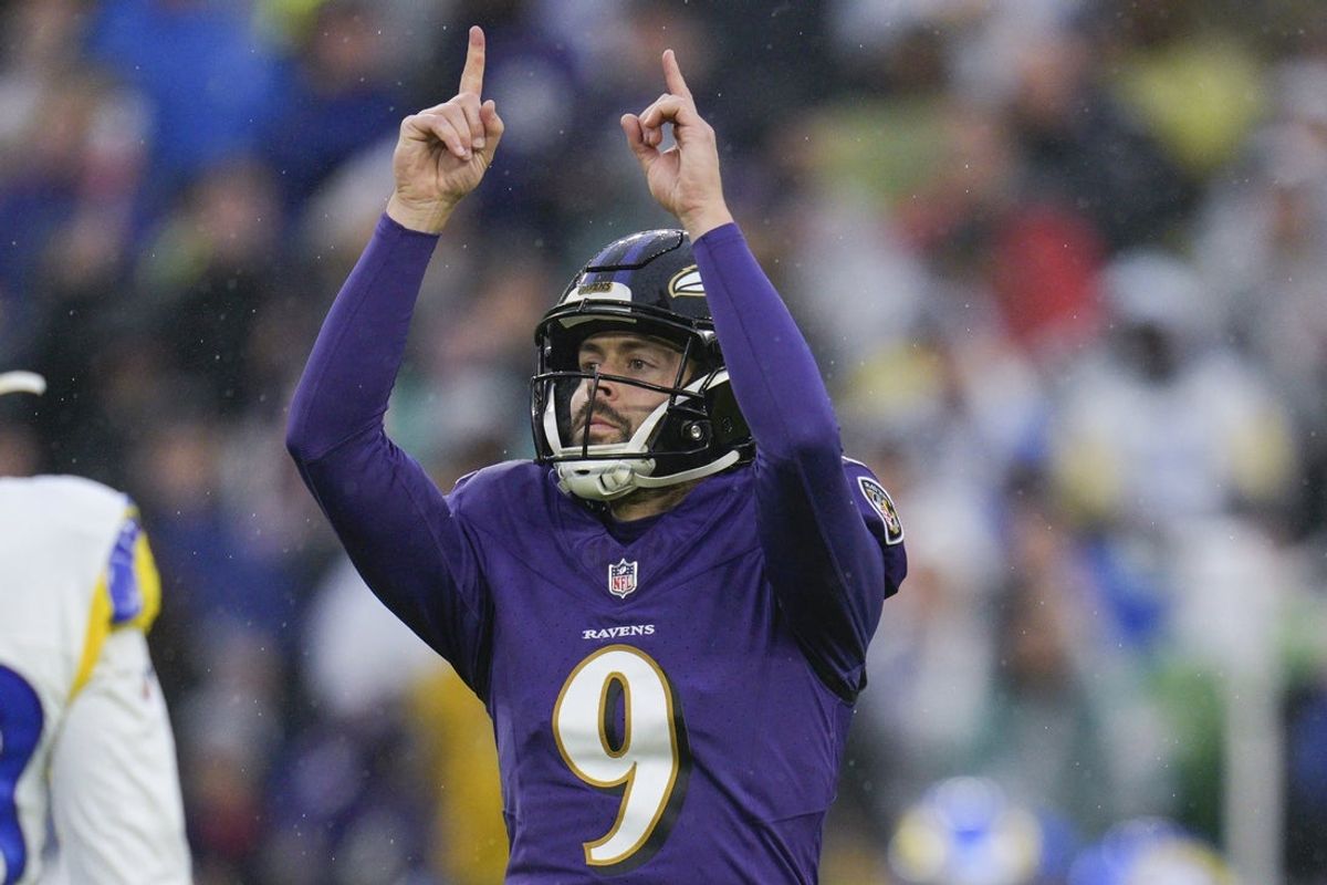 Dec 10, 2023; Baltimore, Maryland, USA;  Baltimore Ravens place kicker Justin Tucker (9) celebrates his field goal during the second half against the Los Angeles Rams at M&T Bank Stadium. Mandatory Credit: Jessica Rapfogel-Imagn Images
