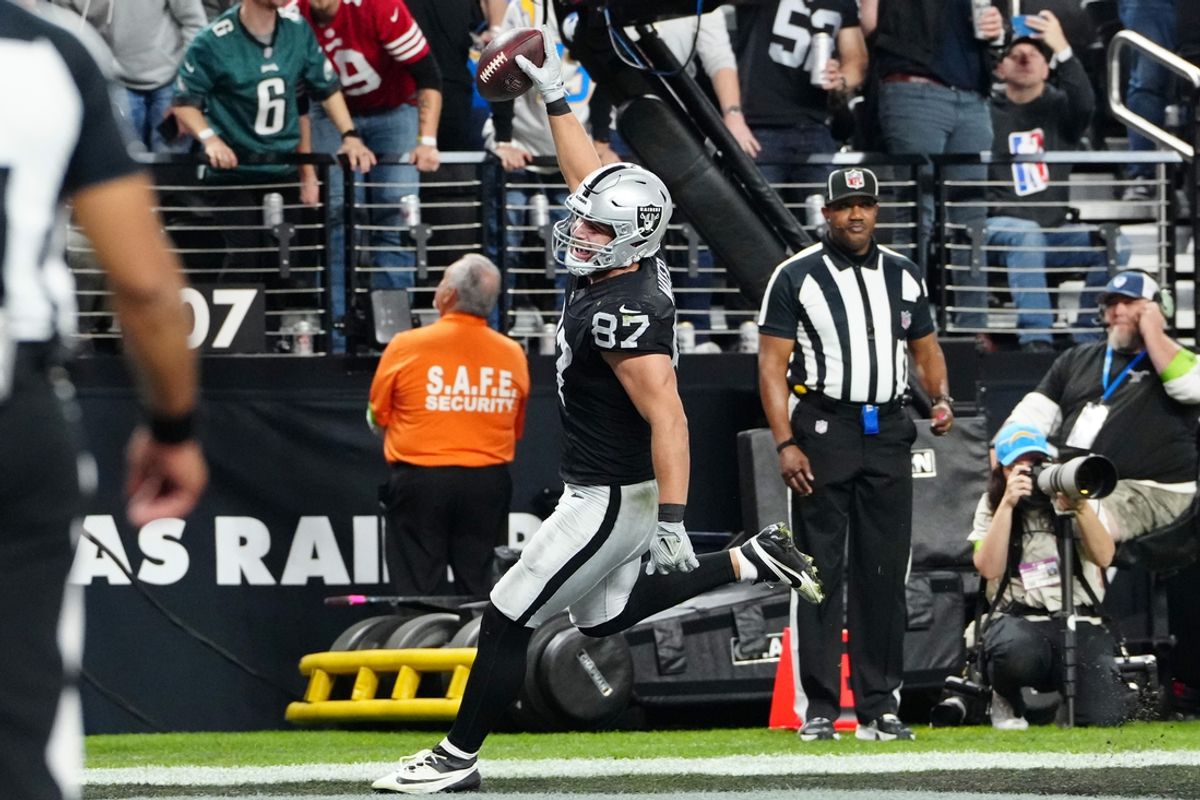 Dec 14, 2023; Paradise, Nevada, USA; Las Vegas Raiders tight end Michael Mayer (87) celebrates as he scores a touchdown in the second quarter against the Los Angeles Chargers at Allegiant Stadium. Mandatory Credit: Stephen R. Sylvanie-Imagn Images