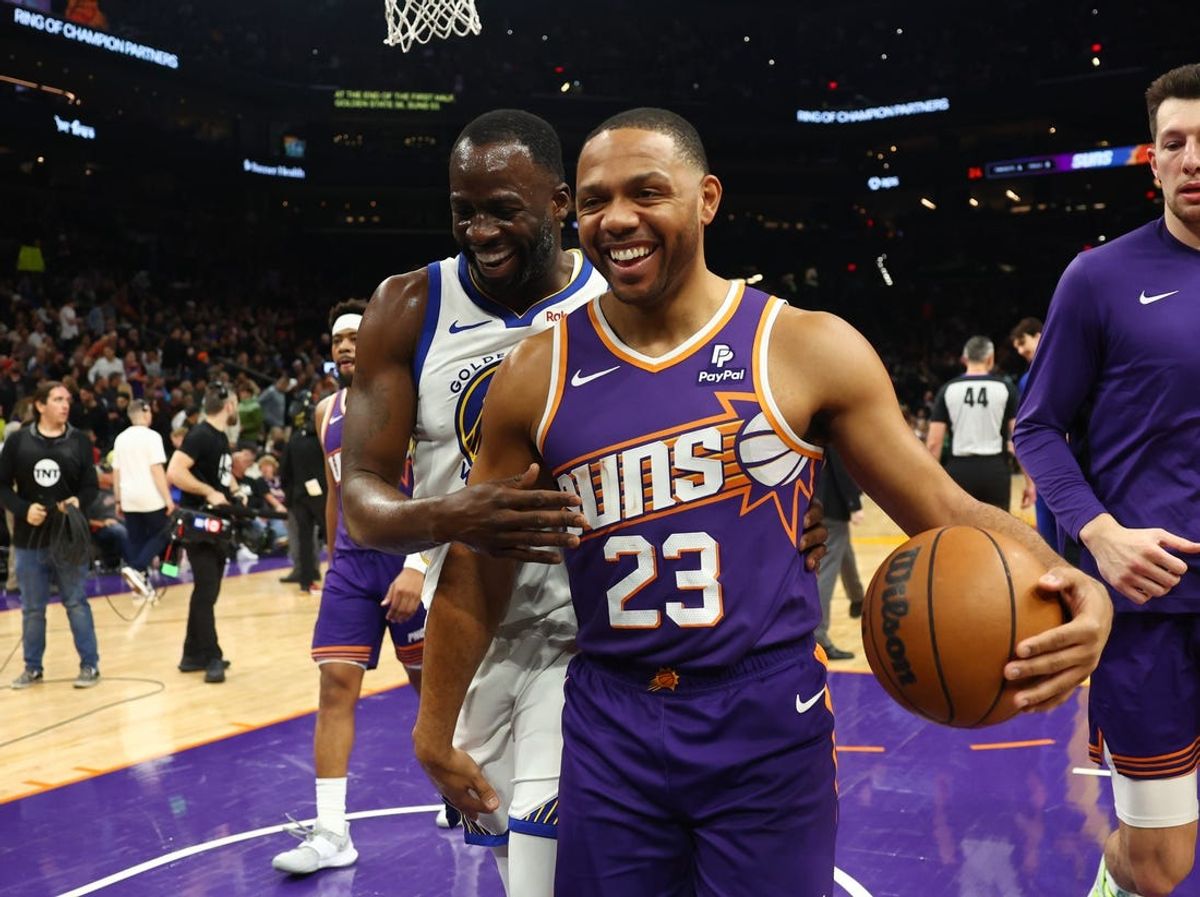 Dec 12, 2023; Phoenix, Arizona, USA; Golden State Warriors forward Draymond Green (left) with Phoenix Suns guard Eric Gordon at Footprint Center. Mandatory Credit: Mark J. Rebilas-USA TODAY Sports