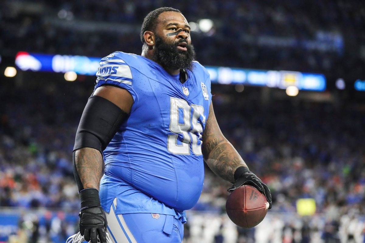 Detroit Lions defensive end Isaiah Buggs (96) walks off the field after recovering the fumble from Denver Broncos quarterback Russell Wilson (3) during the first half at Ford Field in Detroit on Saturday, Dec. 16, 2023.