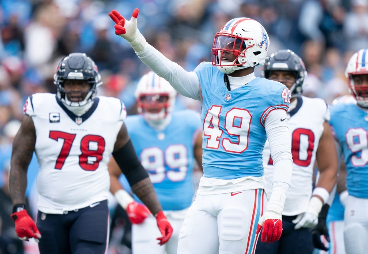 Tennessee Titans linebacker Arden Key (49) helps the referees with a Houston Texans penalty during their game at Nissan Stadium in Nashville, Tenn., Sunday, Dec. 17, 2023.