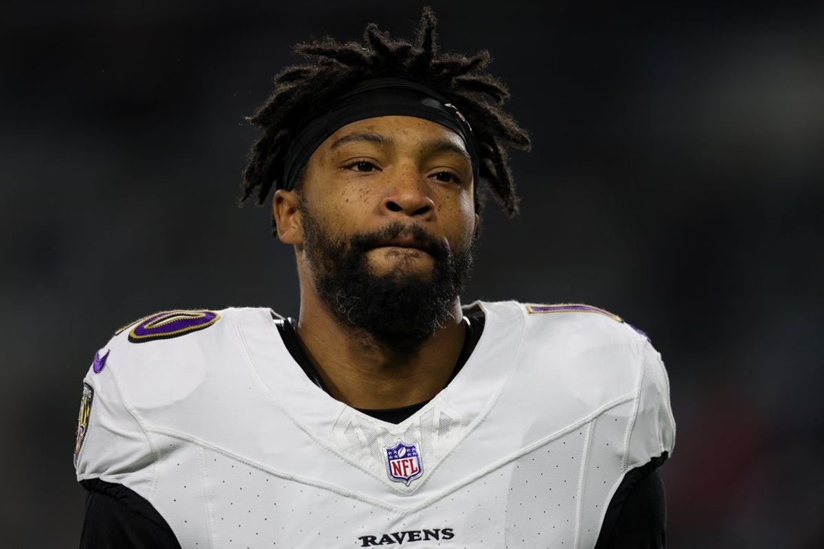 Dec 17, 2023; Jacksonville, Florida, USA; Baltimore Ravens cornerback Arthur Maulet (10) warms up before a game against the Jacksonville Jaguars at EverBank Stadium. Mandatory Credit: Nathan Ray Seebeck-Imagn Images