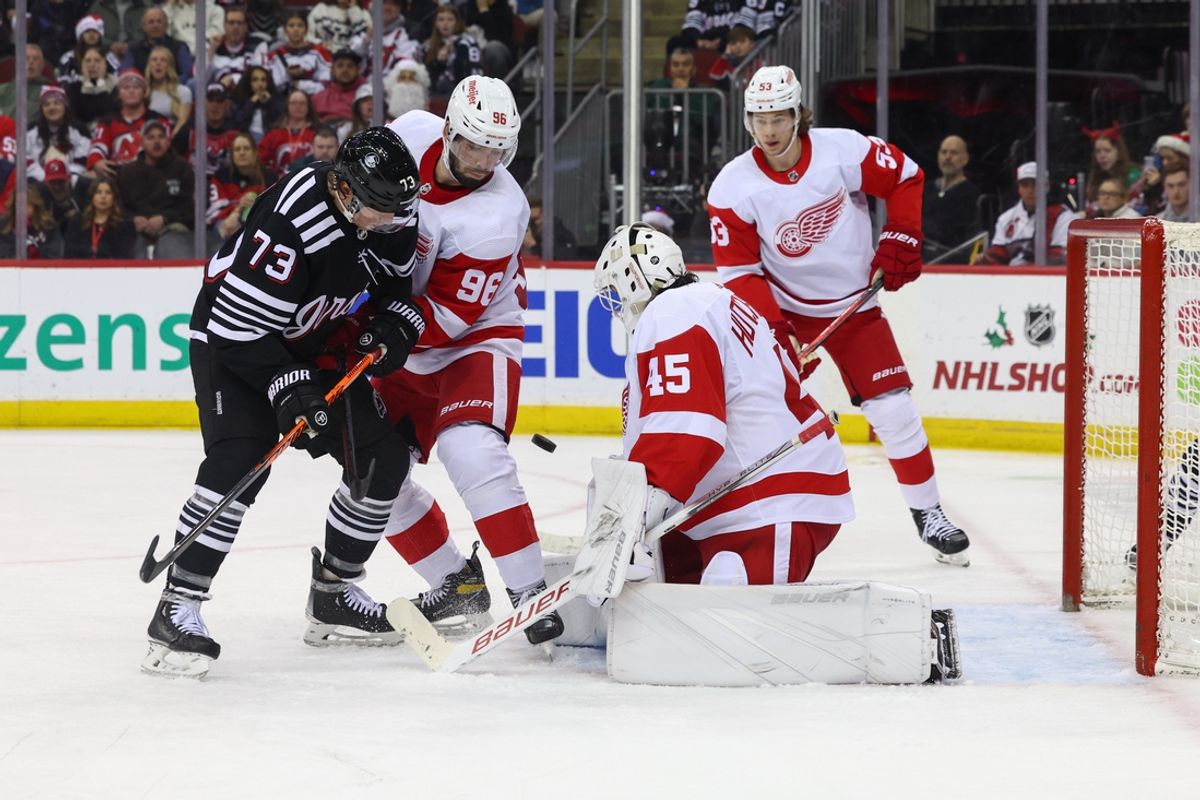 Dec 23, 2023; Newark, New Jersey, USA; Detroit Red Wings goaltender Michael Hutchinson (45) makes a save against the New Jersey Devils during the second period at Prudential Center. Mandatory Credit: Ed Mulholland-Imagn Images
