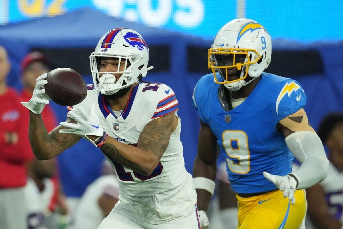 Dec 23, 2023; Inglewood, California, USA; Buffalo Bills wide receiver Gabe Davis (13) catches a 57-yard touchdown pass against the Los Angeles Chargers in the first half at SoFi Stadium. Mandatory Credit: Kirby Lee-Imagn Images