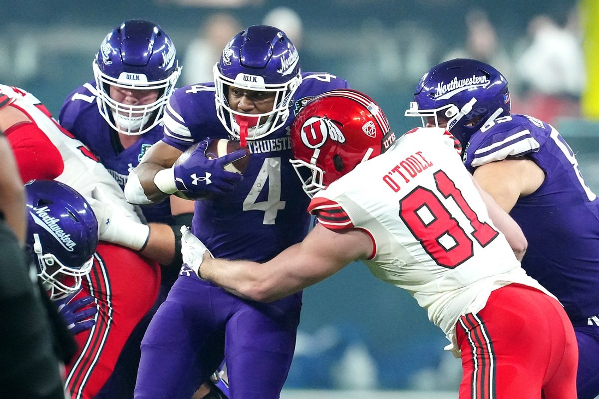 Dec 23, 2023; Las Vagas, NV, USA; Northwestern Wildcats running back Cam Porter (4) is tackled by Utah Utes defensive end Connor O'Toole (81) during the first quarter at Allegiant Stadium. Mandatory Credit: Stephen R. Sylvanie-USA TODAY Sports