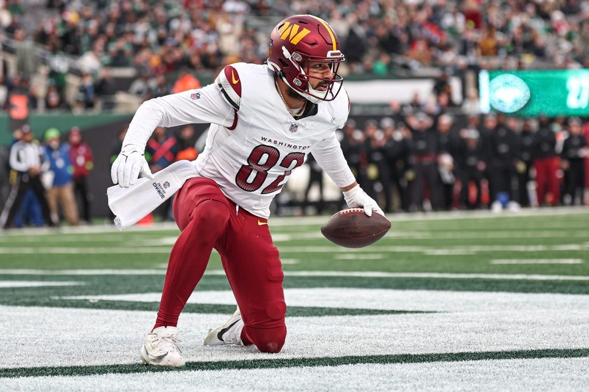 Dec 24, 2023; East Rutherford, New Jersey, USA; Washington Commanders tight end Logan Thomas (82) reacts after a touchdown reception during the second half against the New York Jets at MetLife Stadium. Mandatory Credit: Vincent Carchietta-USA TODAY Sports