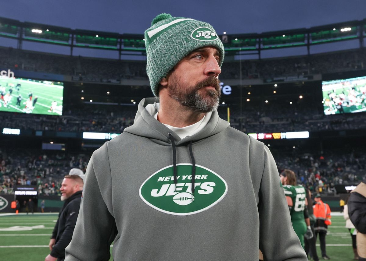 Dec 24, 2023; East Rutherford, New Jersey, USA; New York Jets quarterback Aaron Rodgers (8) on the field after the game against the Washington Commanders at MetLife Stadium. Mandatory Credit: Vincent Carchietta-Imagn Images