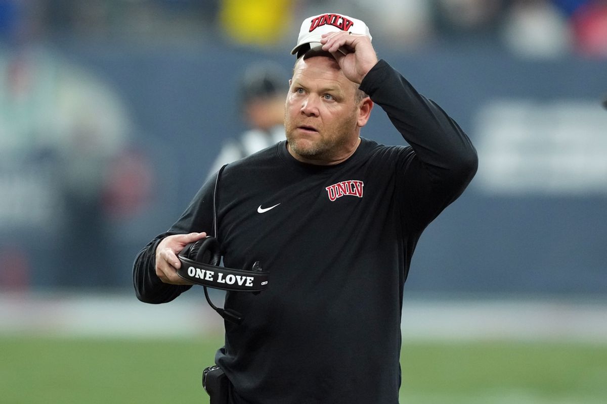 Dec 26, 2023; Phoenix, AZ, USA; UNLV Rebels head coach Barry Odom reacts against the Kansas Jayhawks during the first half at Chase Field. Mandatory Credit: Joe Camporeale-USA TODAY Sports