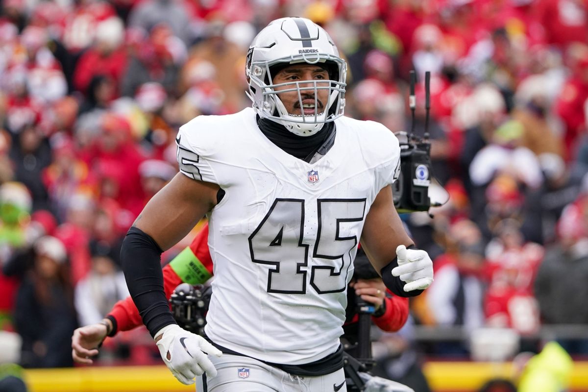 Dec 25, 2023; Kansas City, Missouri, USA; Las Vegas Raiders fullback Jakob Johnson (45) returns to the sidelines after a play against the Kansas City Chiefs during the game at GEHA Field at Arrowhead Stadium. Mandatory Credit: Denny Medley-USA TODAY Sports