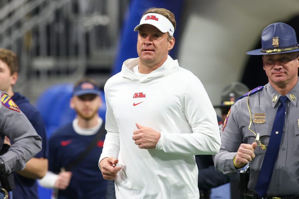 Dec 30, 2023; Atlanta, GA, USA; Mississippi Rebels head coach Lane Kiffin runs on the field before a game against the Penn State Nittany Lions at Mercedes-Benz Stadium. Mandatory Credit: Brett Davis-USA TODAY Sports