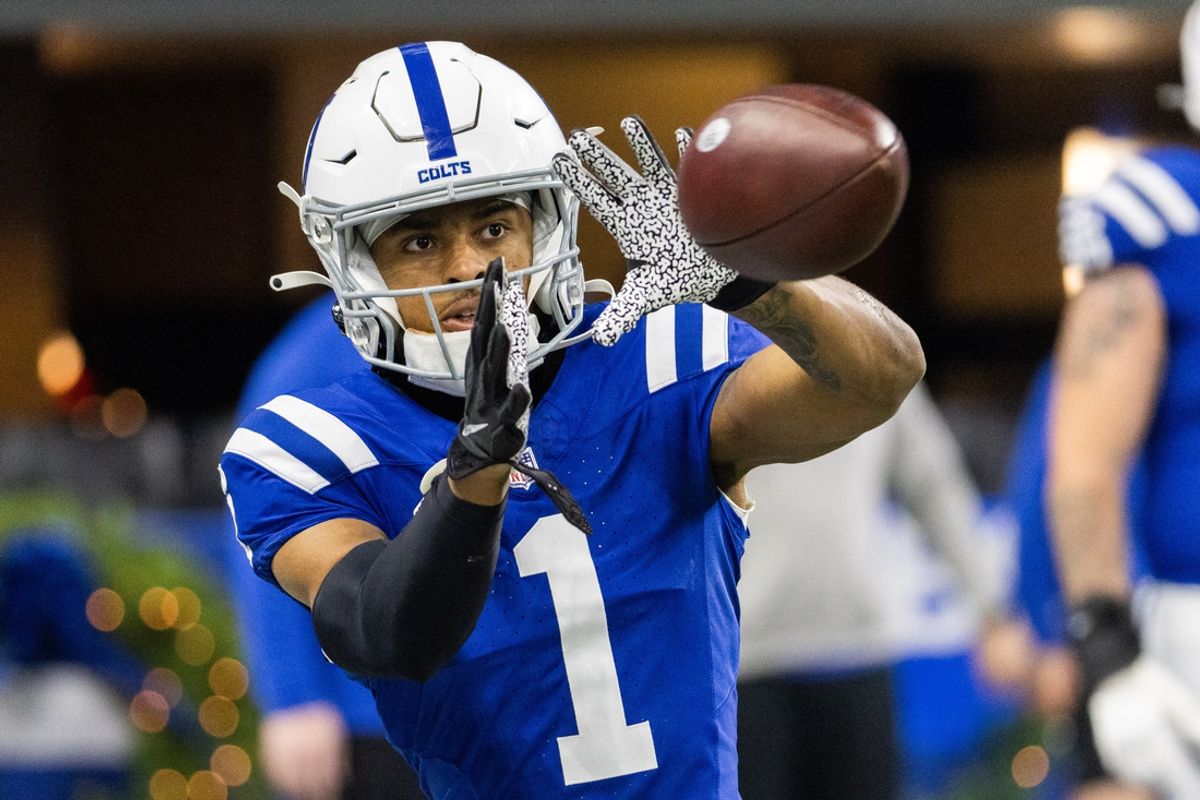 Dec 31, 2023; Indianapolis, Indiana, USA; Indianapolis Colts wide receiver Josh Downs (1) catches a ball during warmups before the game against the Las Vegas Raiders  at Lucas Oil Stadium. Mandatory Credit: Trevor Ruszkowski-Imagn Images