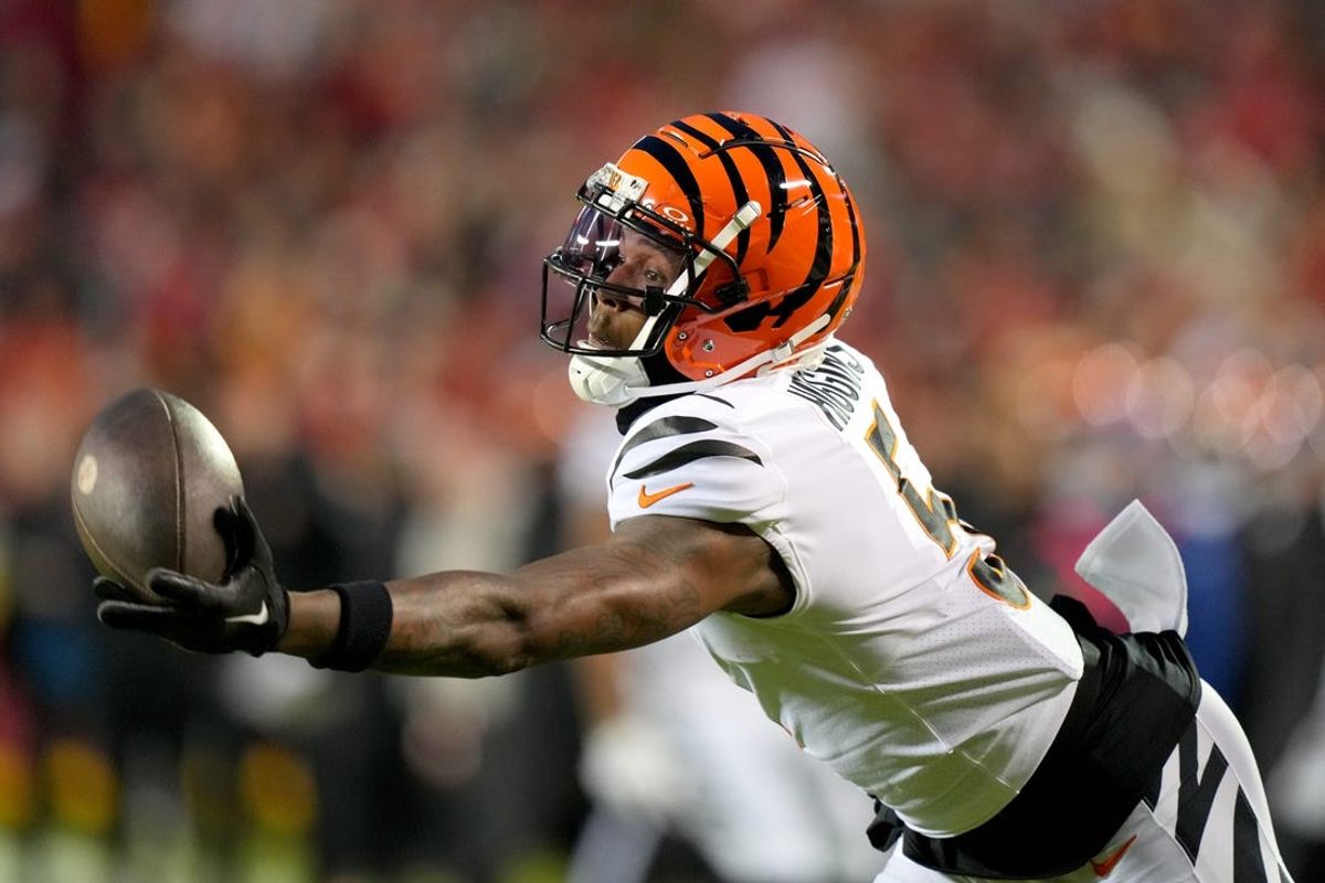 Cincinnati Bengals wide receiver Tee Higgins (5) gets his hand on a deep pass in the third quarter during a Week 17 NFL football game between the Cincinnati Bengals and the Kansas City Chiefs, Sunday, Dec. 31, 2023, at GEHA Field at Arrowhead Stadium in Kansas City, Mo. The Kansas City Chiefs won, 25-17.