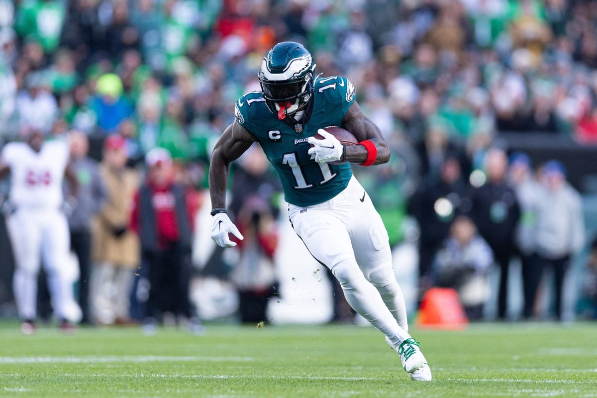 Dec 31, 2023; Philadelphia, Pennsylvania, USA; Philadelphia Eagles wide receiver A.J. Brown (11) runs with the ball during the fourth quarter against the Arizona Cardinals at Lincoln Financial Field. Mandatory Credit: Bill Streicher-Imagn Images