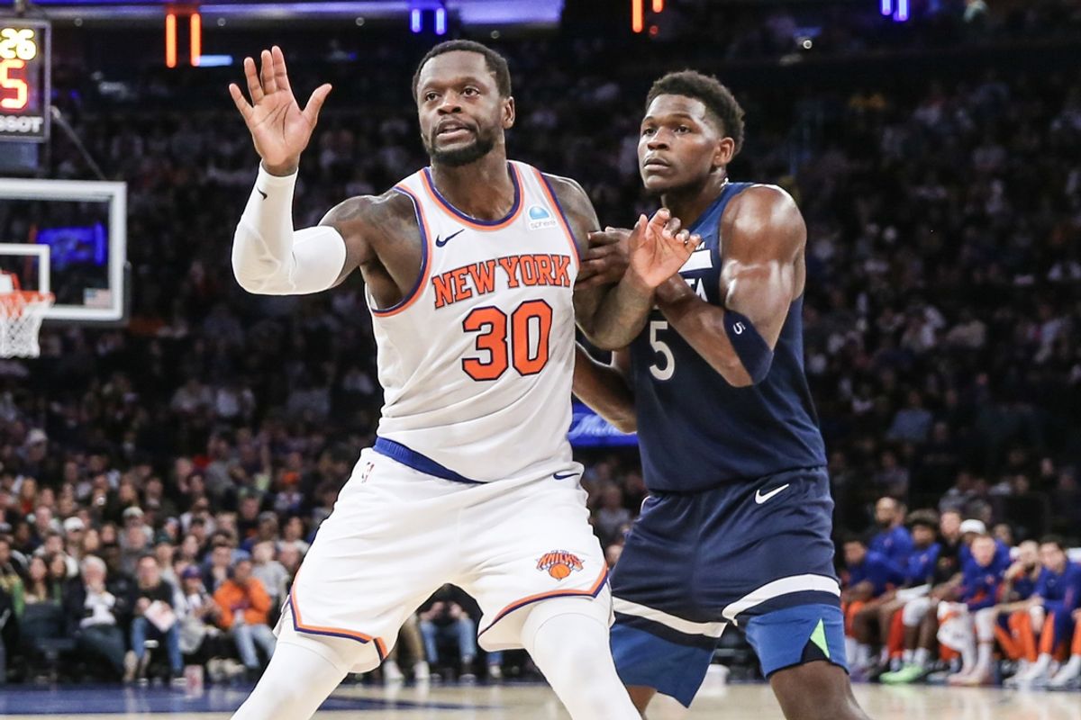 Jan 1, 2024; New York, New York, USA;  New York Knicks forward Julius Randle (30) is defended by Minnesota Timberwolves guard Anthony Edwards (5) while calling for the ball in the third quarter at Madison Square Garden. Mandatory Credit: Wendell Cruz-Imagn Images