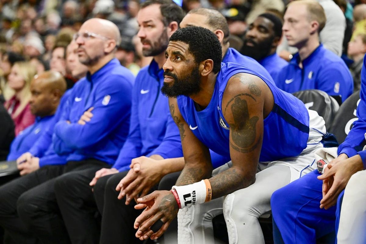 Jan 1, 2024; Salt Lake City, Utah, USA; Dallas Mavericks guard Kyrie Irving (11) on the bench against the Utah Jazz during the second half at the Delta Center. Mandatory Credit: Christopher Creveling-USA TODAY Sports
