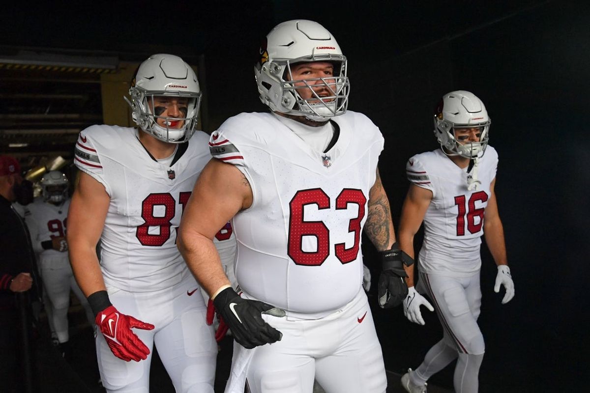 Dec 31, 2023; Philadelphia, Pennsylvania, USA; Arizona Cardinals tight end Travis Vokolek (81), center Trystan Colon (63) and wide receiver Dan Chisena (16) in the tunnel before game against the Philadelphia Eagles at Lincoln Financial Field. Mandatory Credit: Eric Hartline-Imagn Images