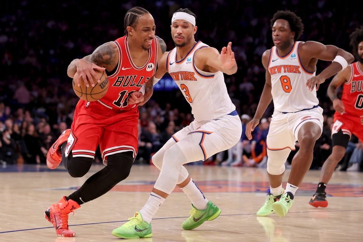 Jan 3, 2024; New York, New York, USA; Chicago Bulls forward DeMar DeRozan (11) drives to the basket against New York Knicks guard Josh Hart (3) and forward OG Anunoby (8) during the fourth quarter at Madison Square Garden. Mandatory Credit: Brad Penner-USA TODAY Sports