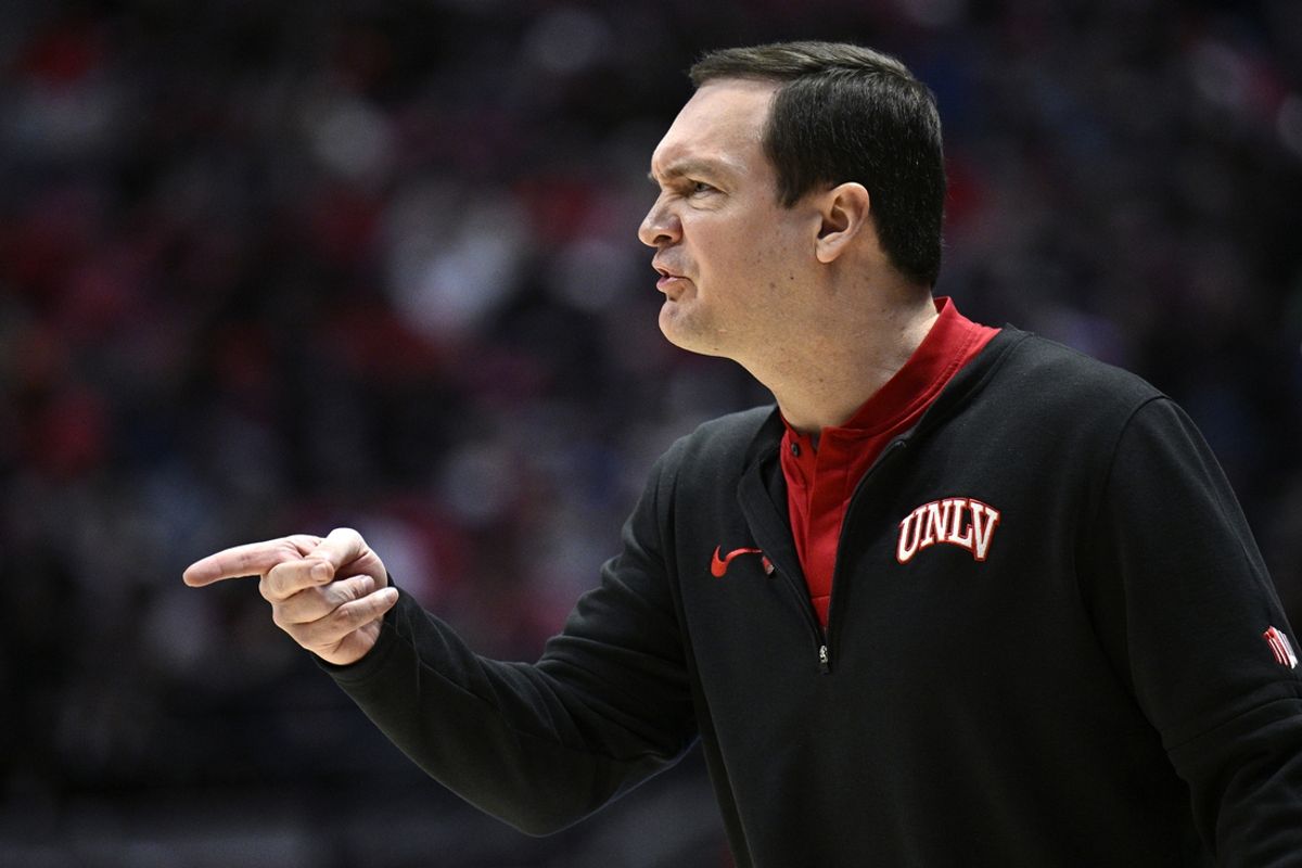 Jan 6, 2024; San Diego, California, USA; UNLV Rebels head coach Kevin Kruger reacts during the first half against the San Diego State Aztecs at Viejas Arena. Mandatory Credit: Orlando Ramirez-Imagn Images