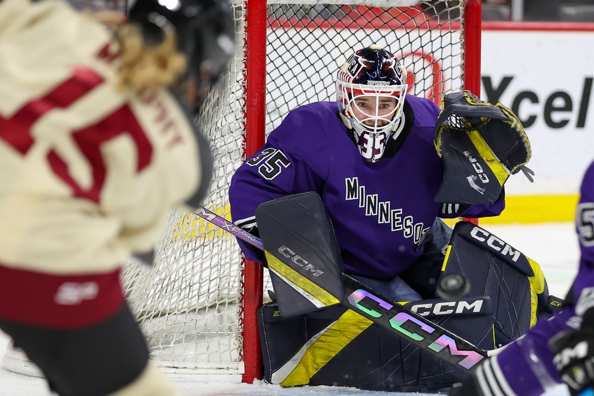 Jan 6, 2024; St. Paul, Minnesota, USA; Minnesota goalie Maddie Rooney (35) defends her net from Montreal forward Maureen Murphy (15) during the second period in a PWHL ice hockey game at XCel Energy Center. Mandatory Credit: Matt Krohn-USA TODAY Sports