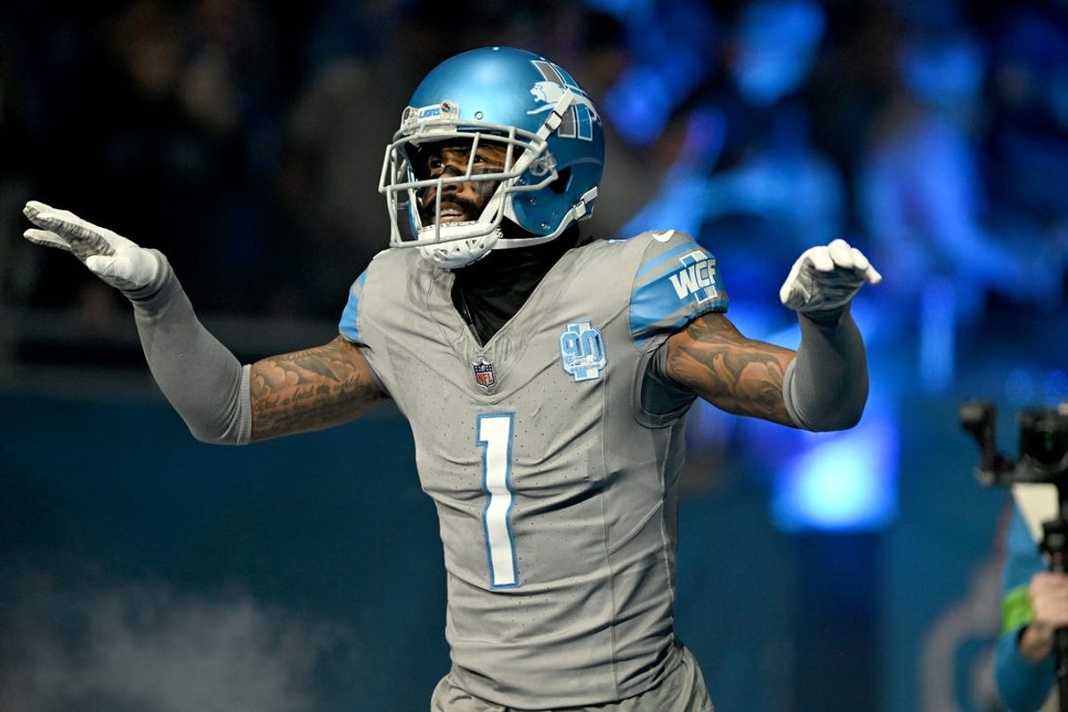 Jan 7, 2024; Detroit, Michigan, USA; Detroit Lions cornerback Cameron Sutton (1) imitates flying as he runs onto the field during player introductions before their game against the Minnesota Vikings at Ford Field. Mandatory Credit: Lon Horwedel-USA TODAY Sports