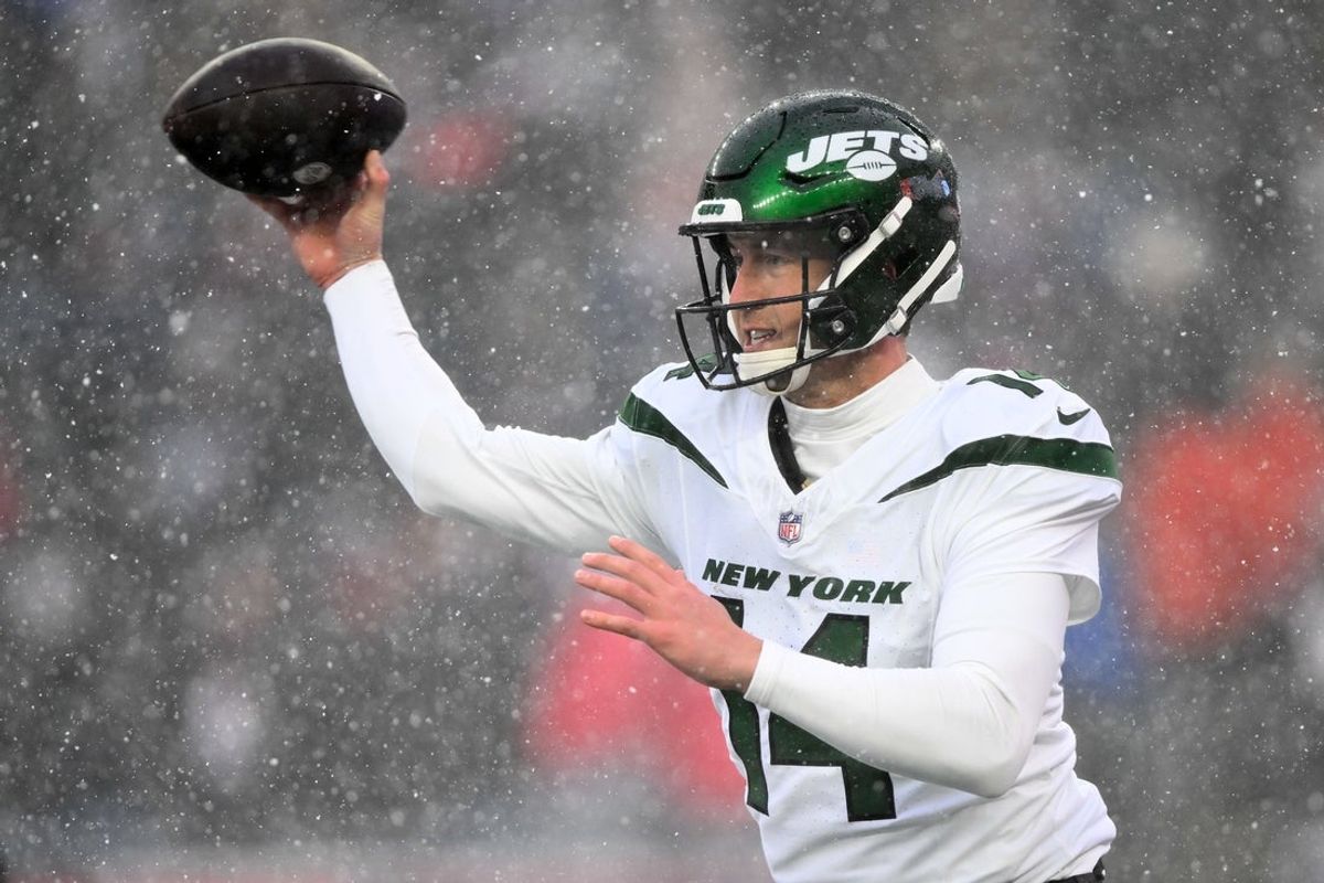 Jan 7, 2024; Foxborough, Massachusetts, USA; New York Jets quarterback Trevor Siemian (14) throws the ball against the New England Patriots during the first half at Gillette Stadium. Mandatory Credit: Brian Fluharty-Imagn Images