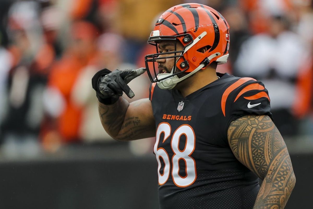 Jan 7, 2024; Cincinnati, Ohio, USA; Cincinnati Bengals defensive tackle Josh Tupou (68) runs onto the field before the game against the Cleveland Browns at Paycor Stadium. Mandatory Credit: Katie Stratman-Imagn Images
