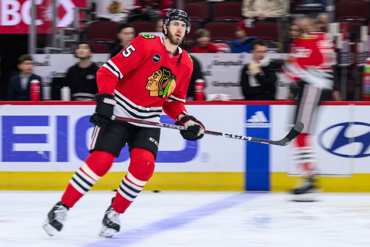Jan 7, 2024; Chicago, Illinois, USA; Chicago Blackhawks defenseman Jarred Tinordi (25) warms up against the Calgary Flames before the game at the United Center. Mandatory Credit: Daniel Bartel-Imagn Images