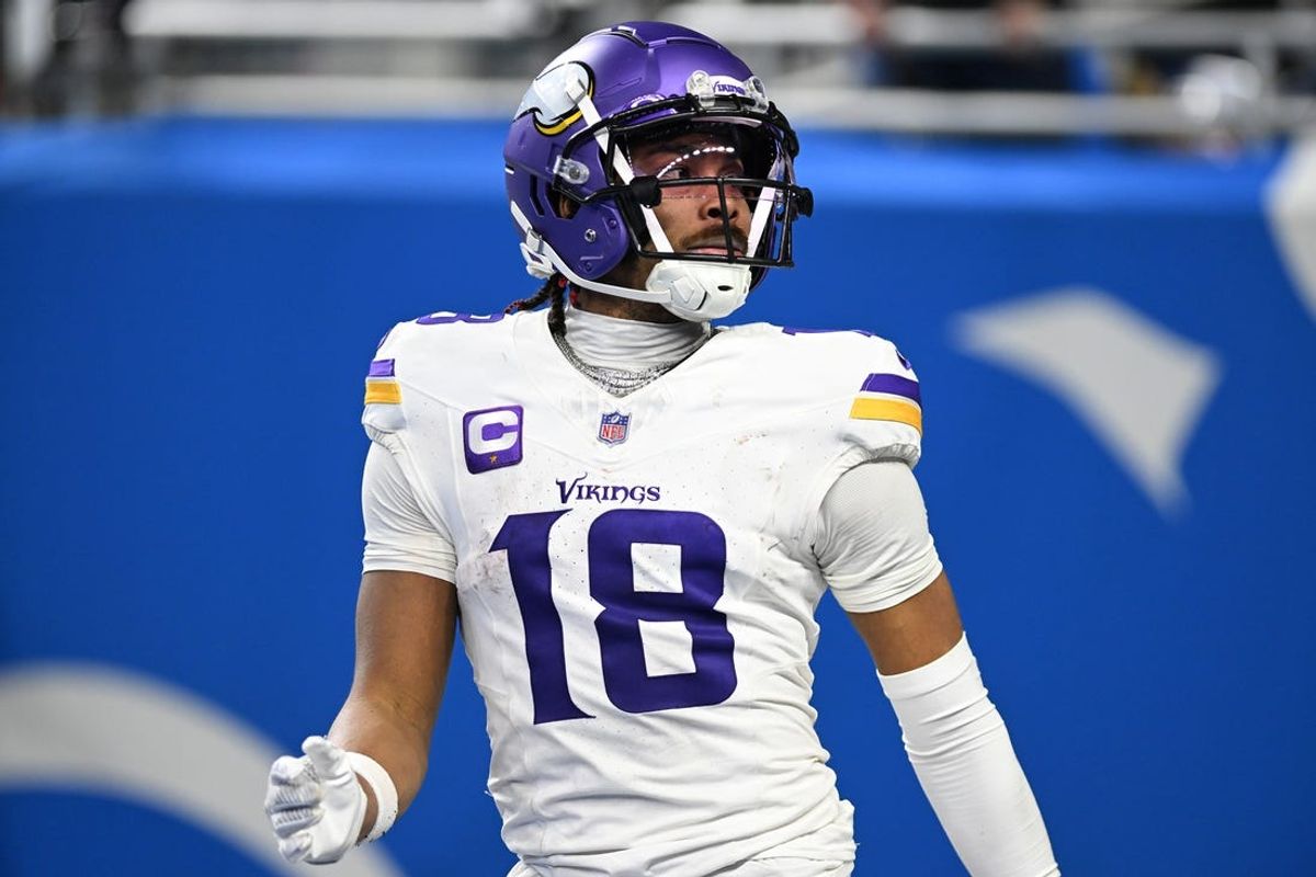 Jan 7, 2024; Detroit, Michigan, USA; Minnesota Vikings wide receiver Justin Jefferson (18) looks up into the crowd after scoring a touchdown against the Detroit Lions in the third quarter at Ford Field. Mandatory Credit: Lon Horwedel-USA TODAY Sports