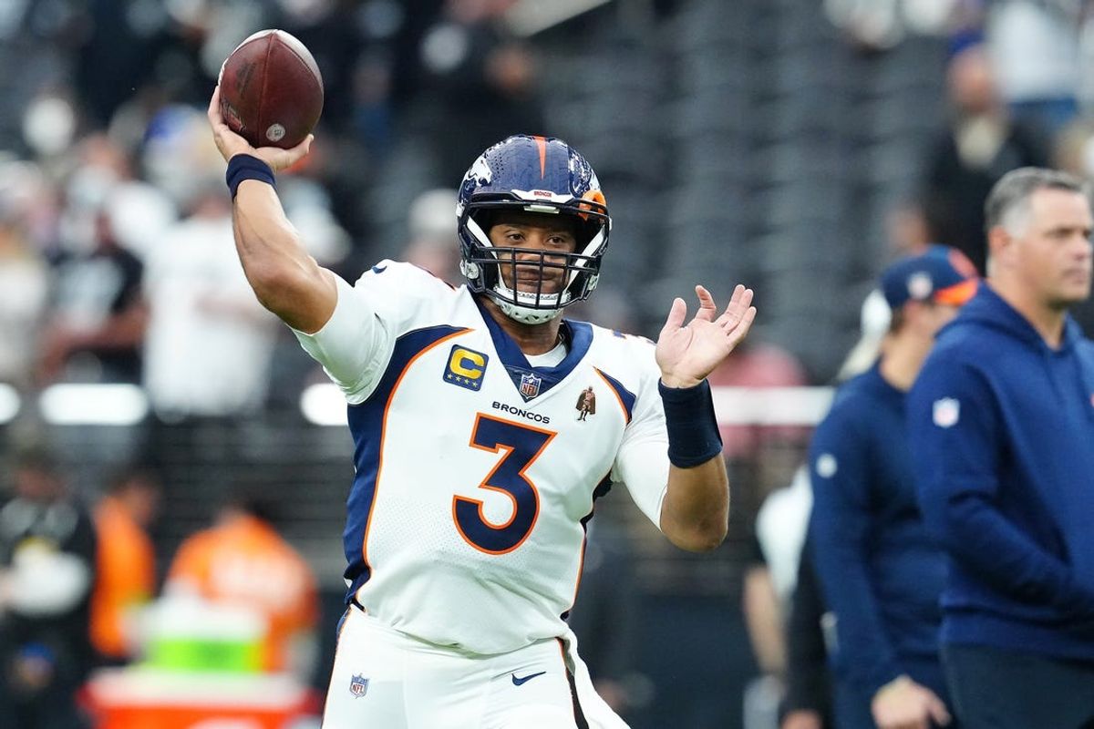 Jan 7, 2024; Paradise, Nevada, USA; Denver Broncos quarterback Russell Wilson (3) warms up before a game against the Las Vegas Raiders at Allegiant Stadium. Mandatory Credit: Stephen R. Sylvanie-USA TODAY Sports