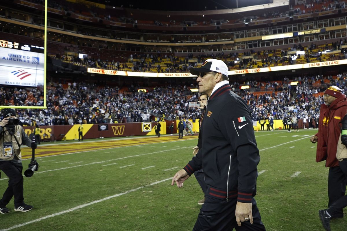 Jan 7, 2024; Landover, Maryland, USA; Washington Commanders head coach Ron Rivera (M) leaves the field after the game against the Dallas Cowboys at FedExField. Mandatory Credit: Geoff Burke-Imagn Images
