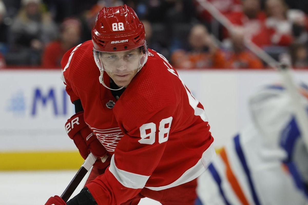 Jan 11, 2024; Detroit, Michigan, USA;  Detroit Red Wings right wing Patrick Kane (88) gets set during a face off in the second period against the Edmonton Oilers at Little Caesars Arena. Mandatory Credit: Rick Osentoski-Imagn Images