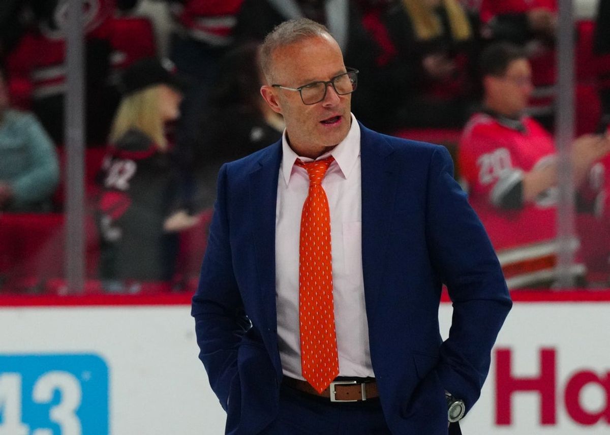 Jan 11, 2024; Raleigh, North Carolina, USA; Anaheim Ducks head coach Greg Cronin walks off the ice after the Ducks loss to the Carolina Hurricanes at PNC Arena. Mandatory Credit: James Guillory-Imagn Images