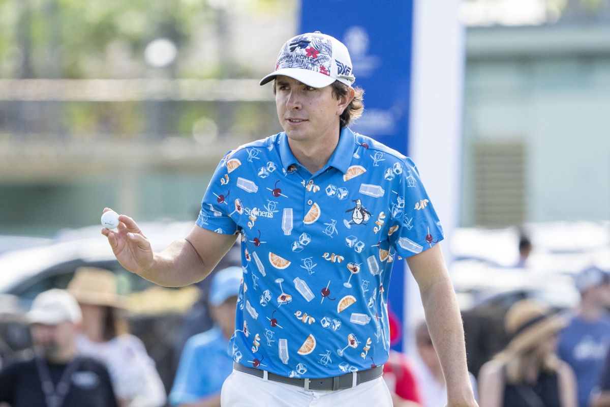 January 12, 2024; Honolulu, Hawaii, USA; Nico Echavarria acknowledges the crowd after making his putt on the ninth hole during the second round of the Sony Open in Hawaii golf tournament at Waialae Country Club. Mandatory Credit: Kyle Terada-Imagn Images