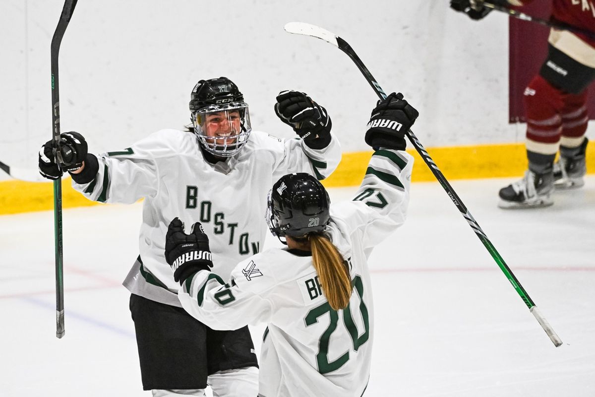 Jan 13, 2024; Montreal, Quebec, CANADA; Boston forward Taylor Girard (17) celebrates with forward Hannah Brandt (20) after scoring a goal against Montreal during the second period in a PWHL ice hockey game at Verdun Auditorium. Mandatory Credit: David Kirouac-Imagn Images