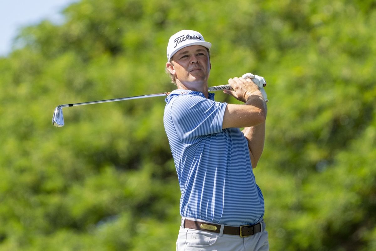 January 13, 2024; Honolulu, Hawaii, USA; Patton Kizzire hits his tee shot on the second hole during the third round of the Sony Open in Hawaii golf tournament at Waialae Country Club. Mandatory Credit: Kyle Terada-Imagn Images