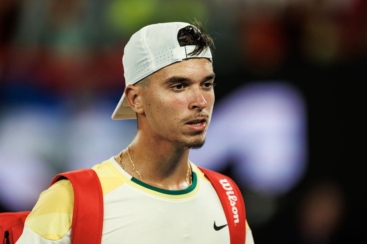 Jan 14, 2024; Melbourne, Victoria, Australia; Dino Prizmic of Croatia leaves Rod Laver Arena after losing to Novak Djokovic of Serbia in the first round of the men s singles. Mandatory Credit: Mike Frey-Imagn Images