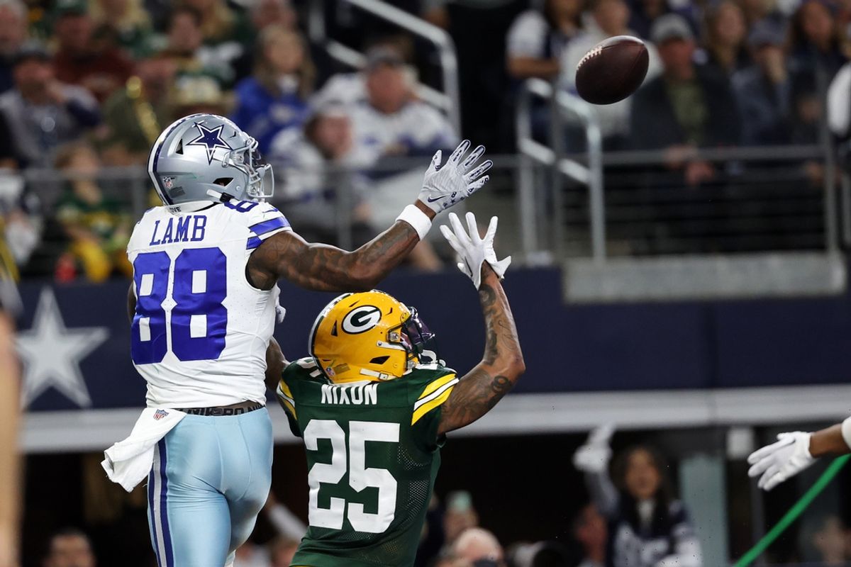 Jan 14, 2024; Arlington, Texas, USA; Green Bay Packers cornerback Keisean Nixon (25) break sup a pass against Dallas Cowboys wide receiver CeeDee Lamb (88) during the second half for the 2024 NFC wild card game at AT&T Stadium. Mandatory Credit: Kevin Jairaj-USA TODAY Sports