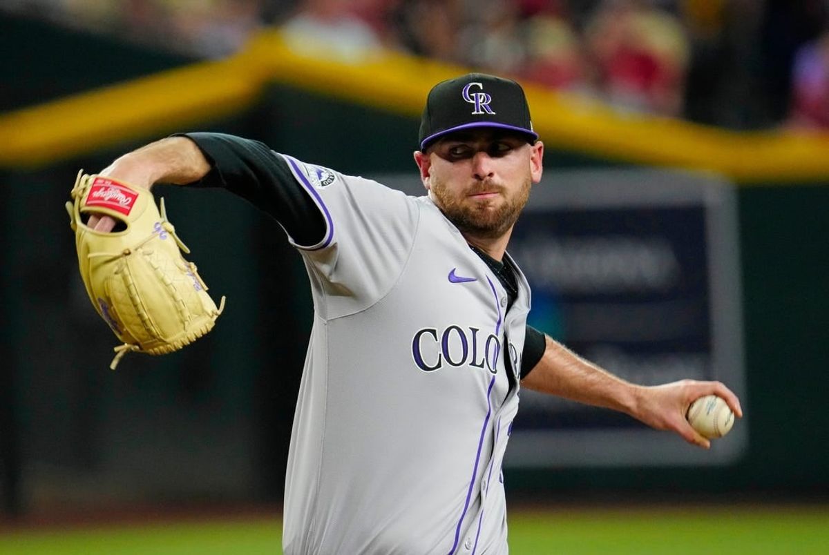 March 30, 2024; Phoenix, Ariz; U.S.; Rockies pitcher Austin Gomber (26) pitches against the Diamondbacks during a game at Chase Field.