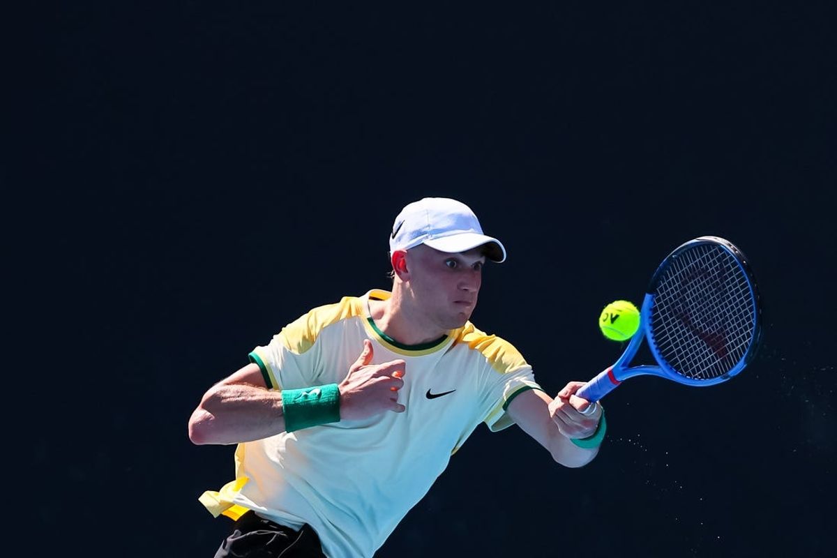 Jan 16, 2024; Melbourne, Victoria, Australia; Jack Draper of Great Britain plays a shot against Marcos Giron (not pictured) of the United States in Round 1 of the Men's Singles on Day 3 of the Australian Open tennis at Rod Laver Arena. Mandatory Credit: Mike Frey-USA TODAY Sports