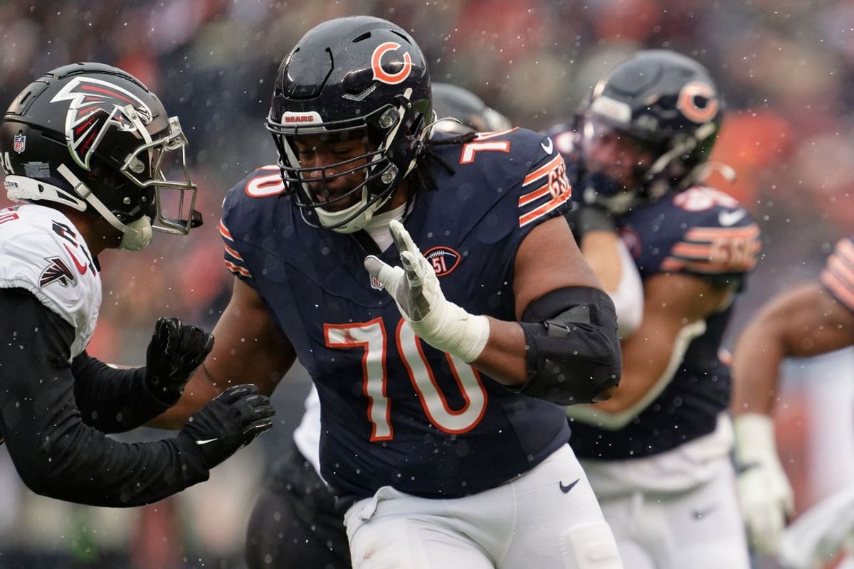 Chicago Bears offensive lineman Braxton Jones (70) blocks against the Atlanta Falcons at Soldier Field. Mandatory Credit: Jamie Sabau-Imagn Images