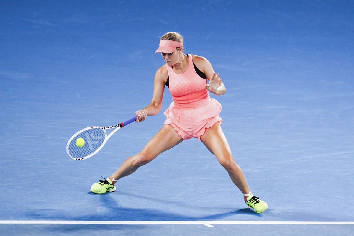 Jan 18, 2024; Melbourne, Victoria, Australia; Danielle Collins of the United States plays a shot against Iga Swiatek (not pictured) of Poland in Round 2 of the Women's Singles on Day 5 of the Australian Open tennis at Rod Laver Arena. Mandatory Credit: Mike Frey-Imagn Images