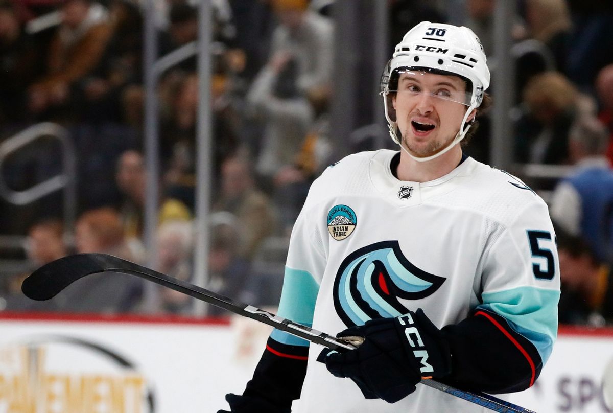 Jan 15, 2024; Pittsburgh, Pennsylvania, USA;  Seattle Kraken right wing Kailer Yamamoto (56) reacts on the ice against the Pittsburgh Penguins during the second period at PPG Paints Arena. Mandatory Credit: Charles LeClaire-Imagn Images