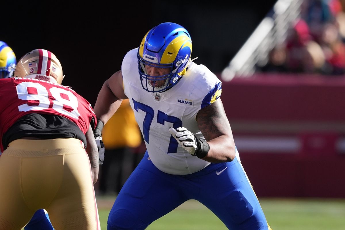 Jan 7, 2024; Santa Clara, California, USA; Los Angeles Rams offensive tackle Alaric Jackson (77) blocks San Francisco 49ers defensive tackle Javon Hargrave (98) during the first quarter at Levi's Stadium. Mandatory Credit: Darren Yamashita-USA TODAY Sports
