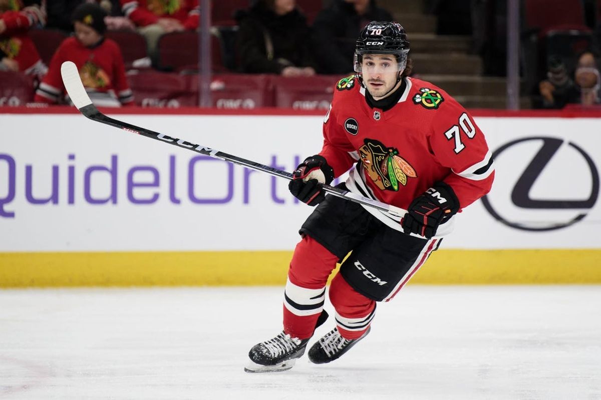 Jan 13, 2024; Chicago, Illinois, USA;  Chicago Blackhawks forward Cole Guttman (70) skates against the Dallas Stars at United Center. Mandatory Credit: Jamie Sabau-USA TODAY Sports