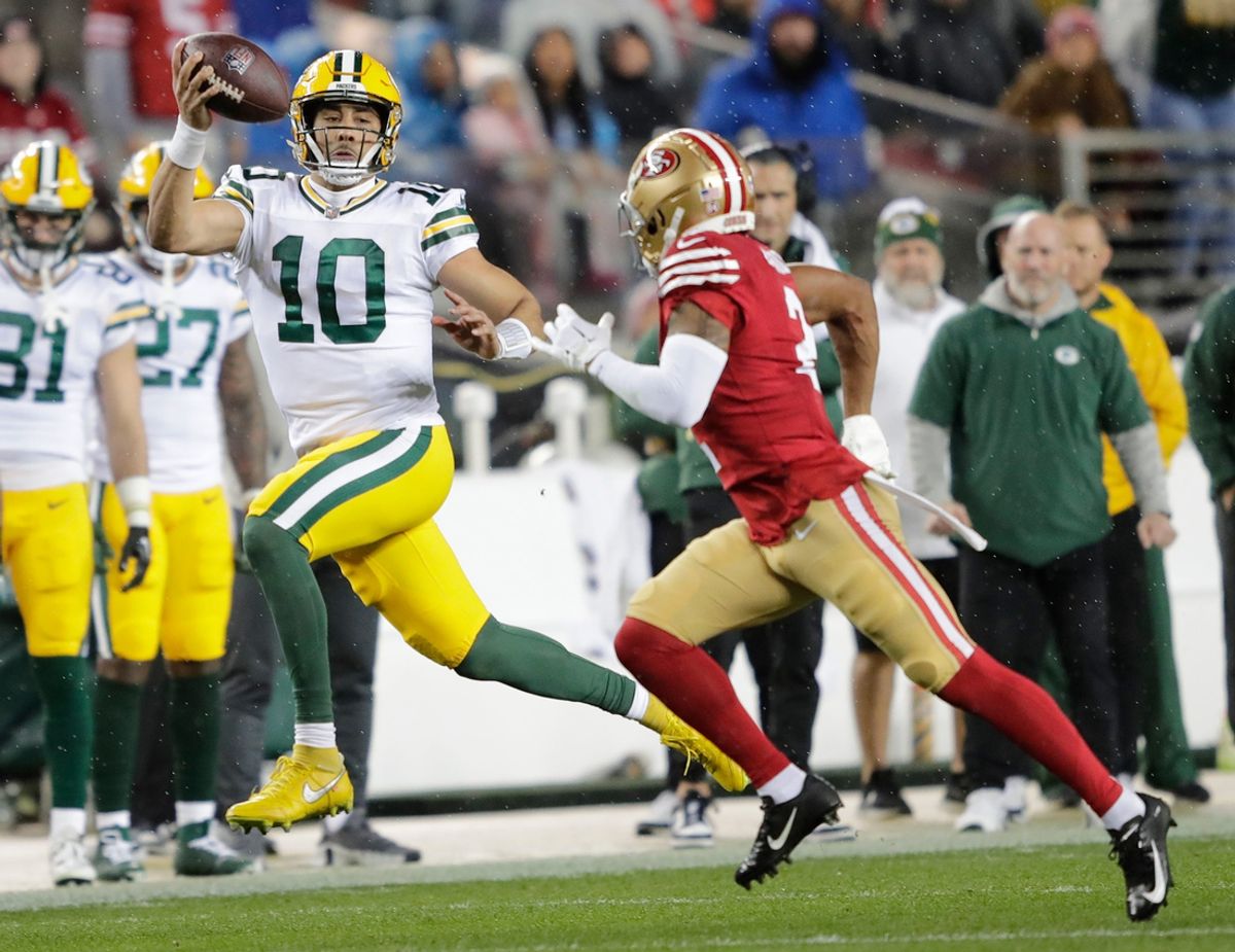 Green Bay Packers quarterback Jordan Love (10) looks to pass against San Francisco 49ers cornerback Deommodore Lenoir (2) during their NFC divisional playoff football game Saturday, January 20, 2024, at Levi's Stadium in Santa Clara, California.