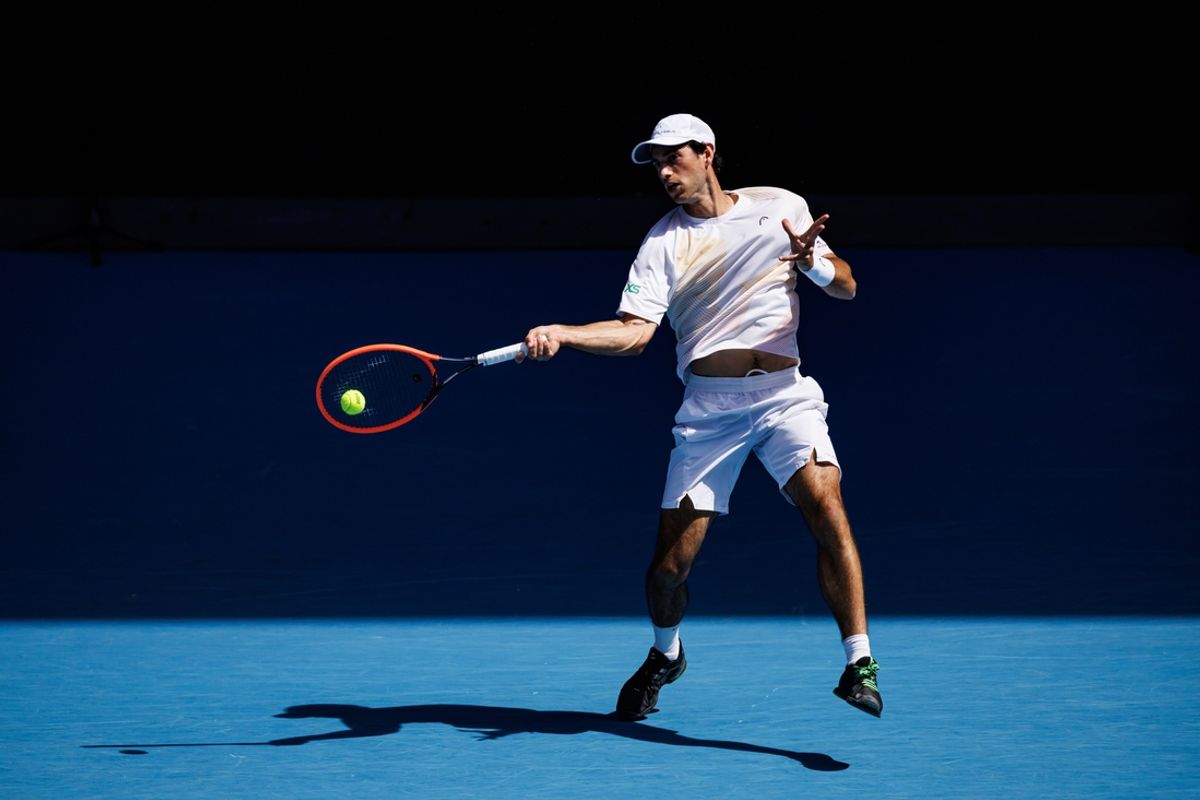 Jan 22, 2024; Melbourne, Victoria, Australia; Nuno Borges of Portugal hits a shot against Daniil Medvedev of Russia in the fourth round of the men   s singles at the Australian Open in MelbourneMandatory Credit: Mike Frey-USA TODAY Sports